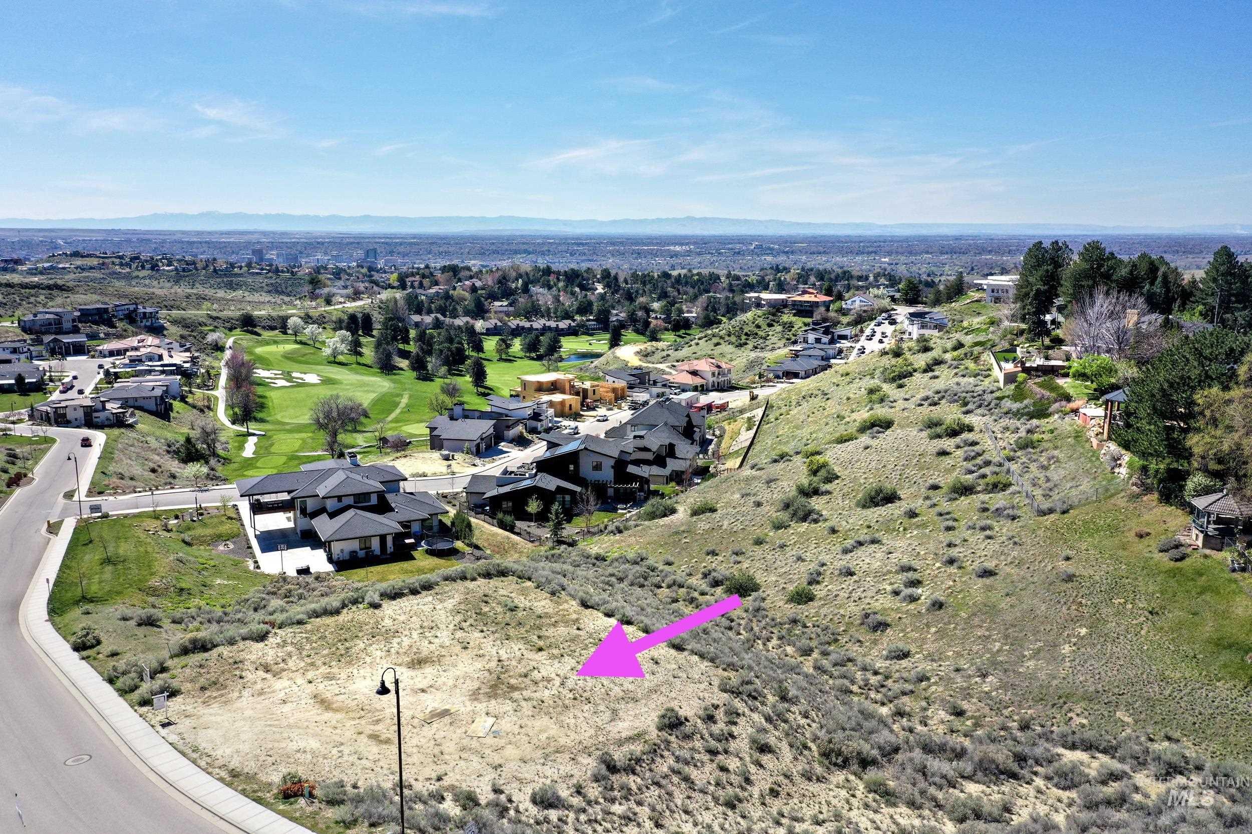 Aerial perspective of suburban area with a golf club