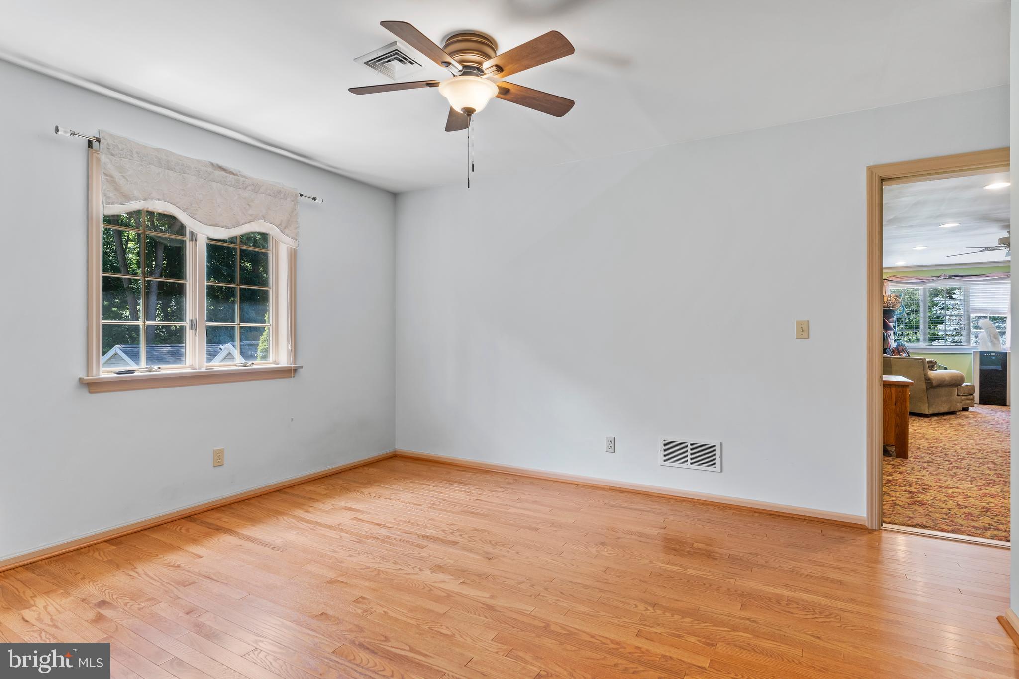 176 Richland Road Carlisle, PA 17015 - Photo 30 of 59 wooden floor in an empty room with a window