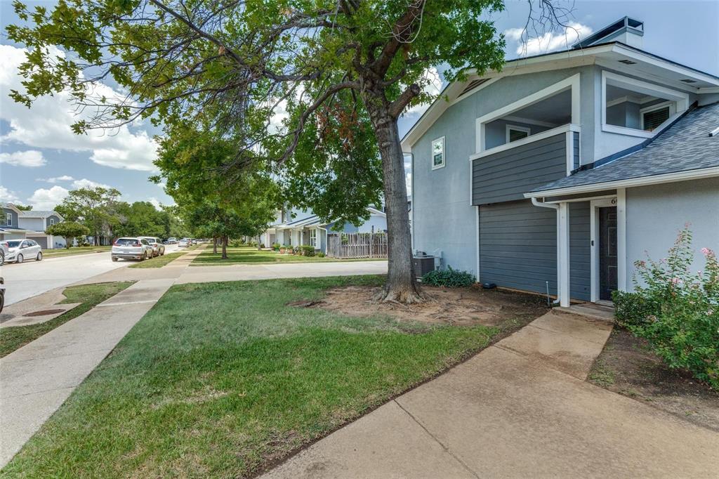 606 Ridgeline Drive Hurst, TX 76053 - Photo 18 of 29 a front view of a house with a yard