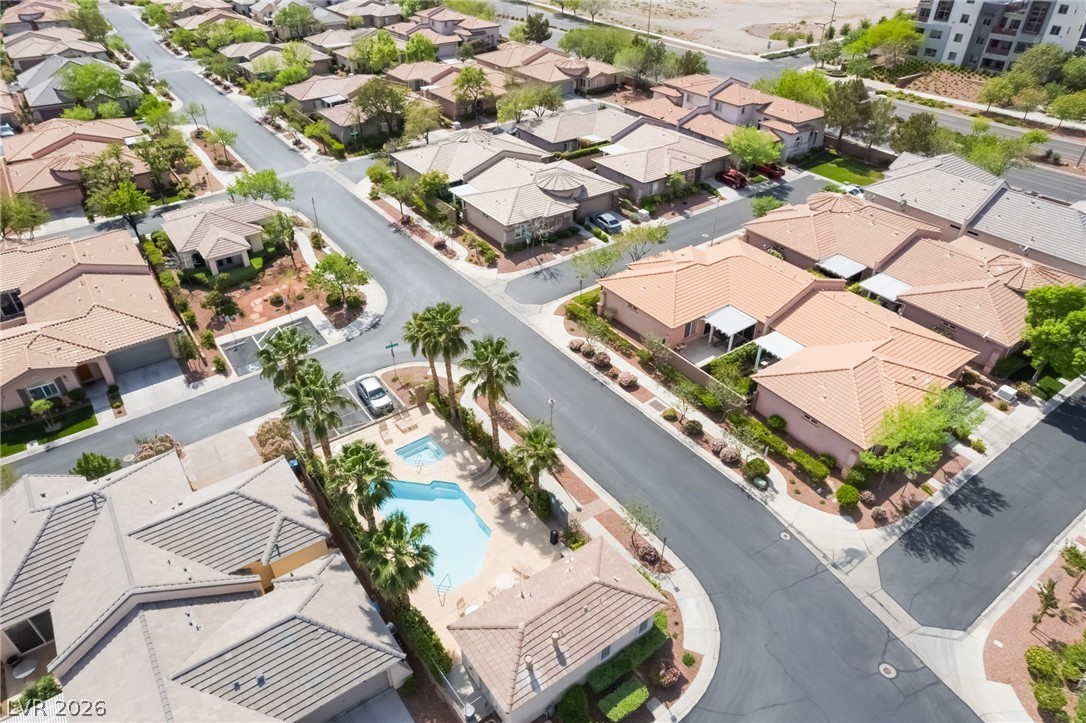 10481 Riverside Park Avenue Las Vegas, NV 89135 - Photo 50 of 51 Aerial perspective of Community pool and homes in the community