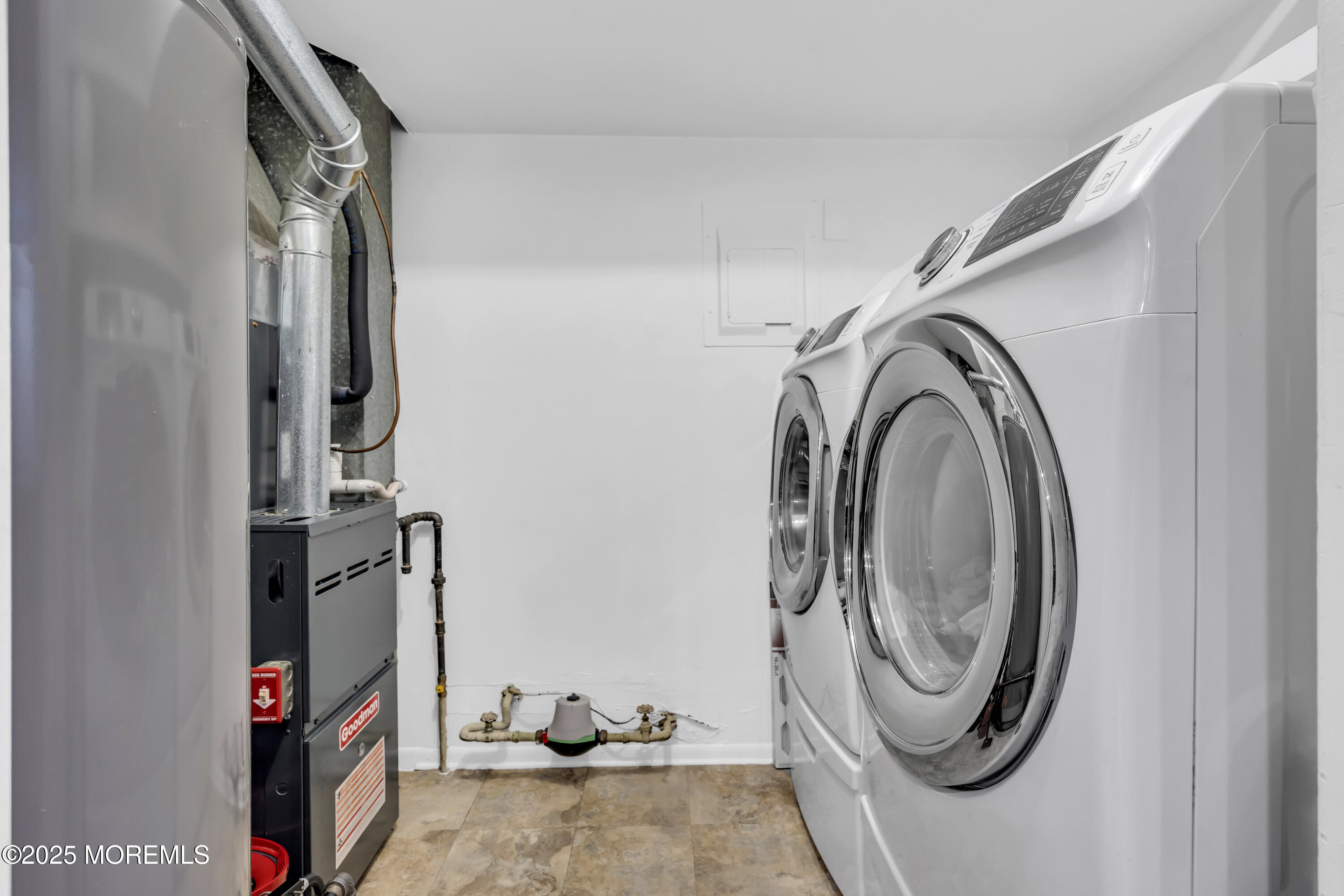 512 Harding Road, Unit 6 Freehold, NJ 07728 - Photo 23 of 36 a view of storage and utility room with washer and dryer