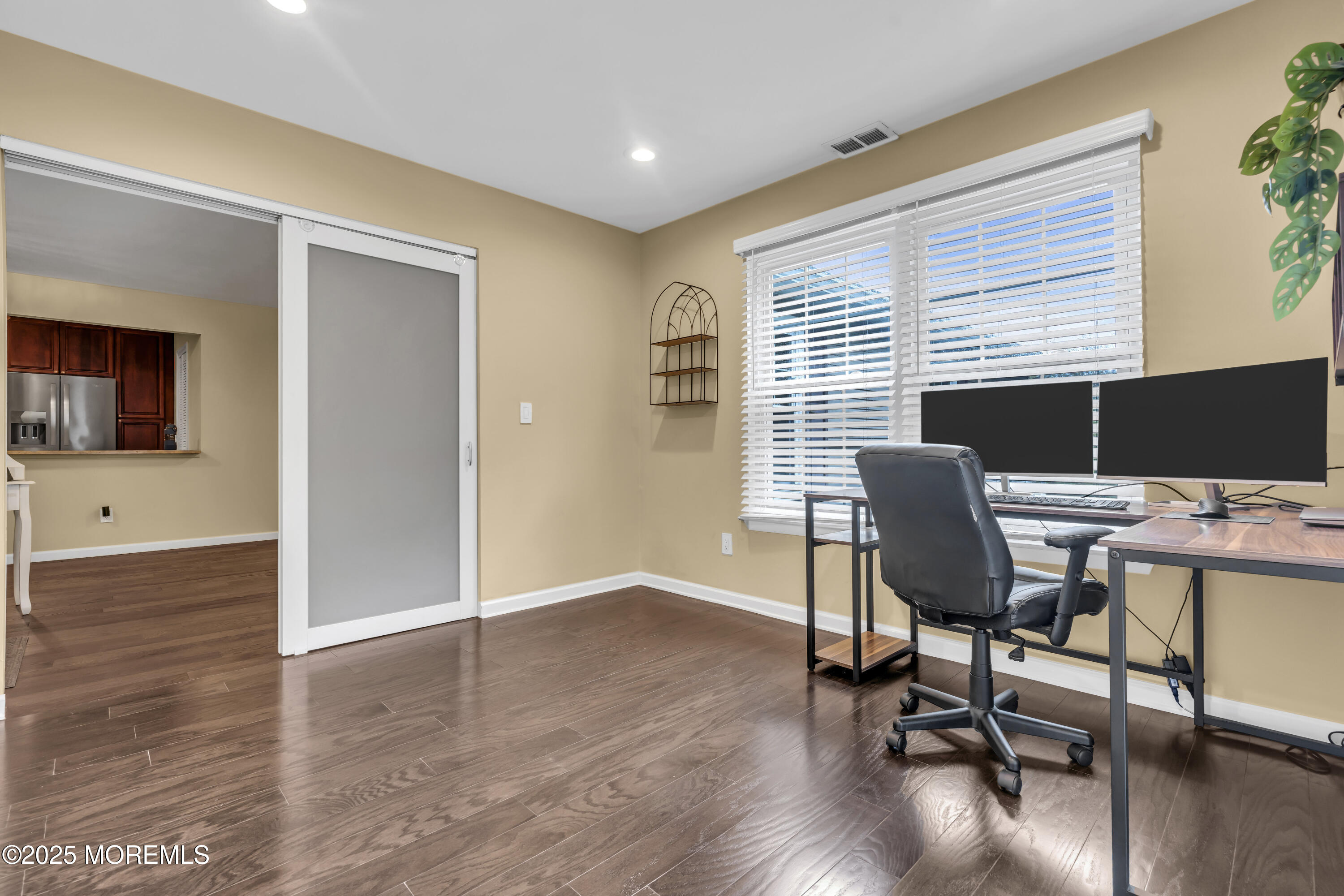 512 Harding Road, Unit 6 Freehold, NJ 07728 - Photo 8 of 36 a view of a workspace with furniture and a window