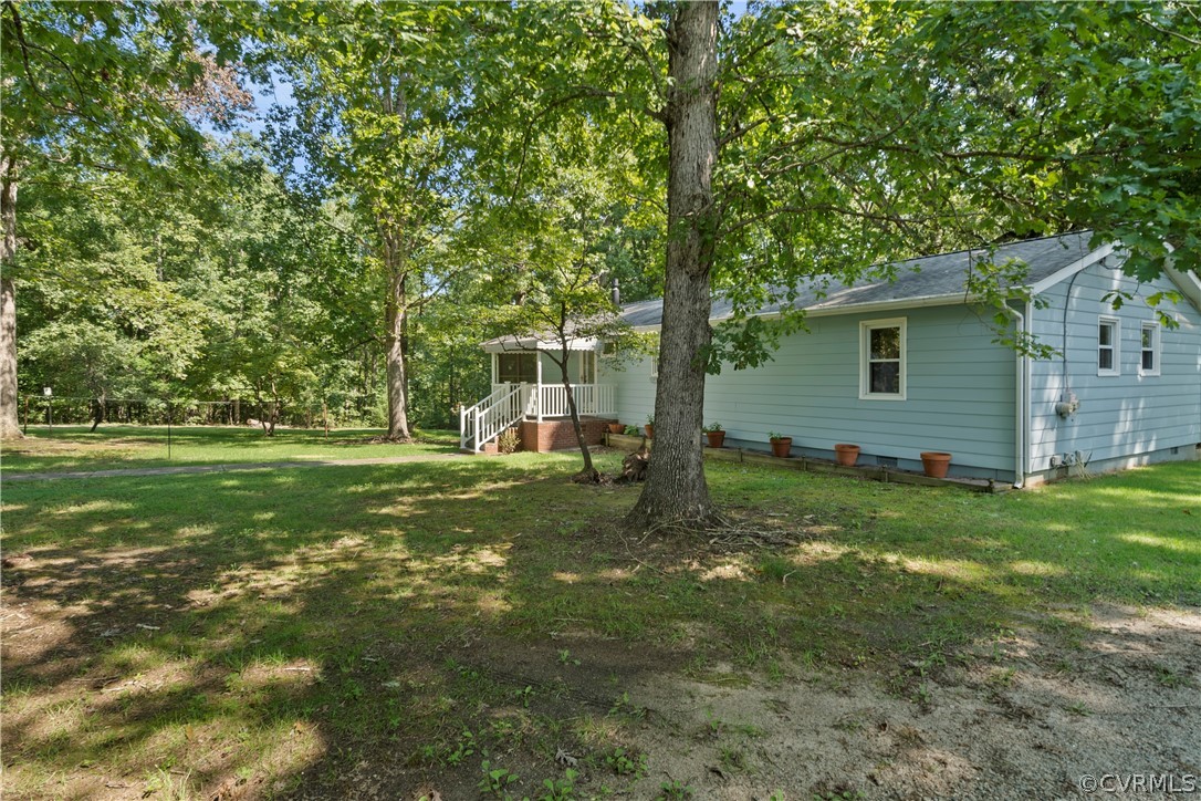 14608 Nash Road Chesterfield, VA 23838 - Photo 32 of 42 a view of a house with a backyard
