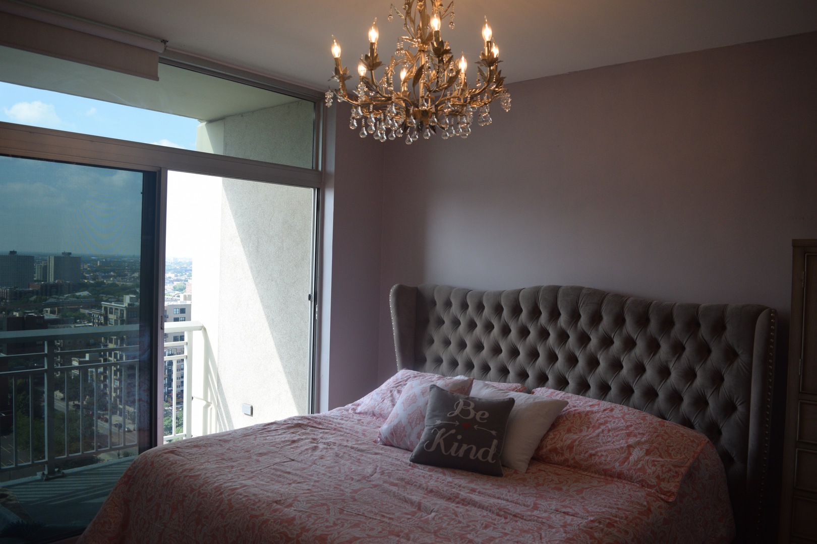 1400 South Michigan Avenue, Unit 2108 Chicago, IL 60605 - Photo 6 of 14 a bed sitting in a bedroom next to a window