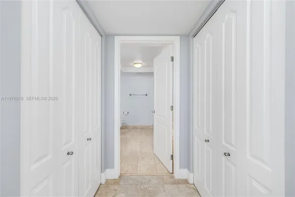 a bed room with a bed and a window