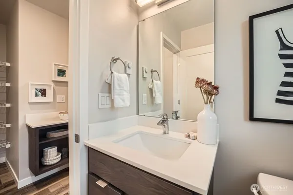 a bathroom with a sink and a mirror
