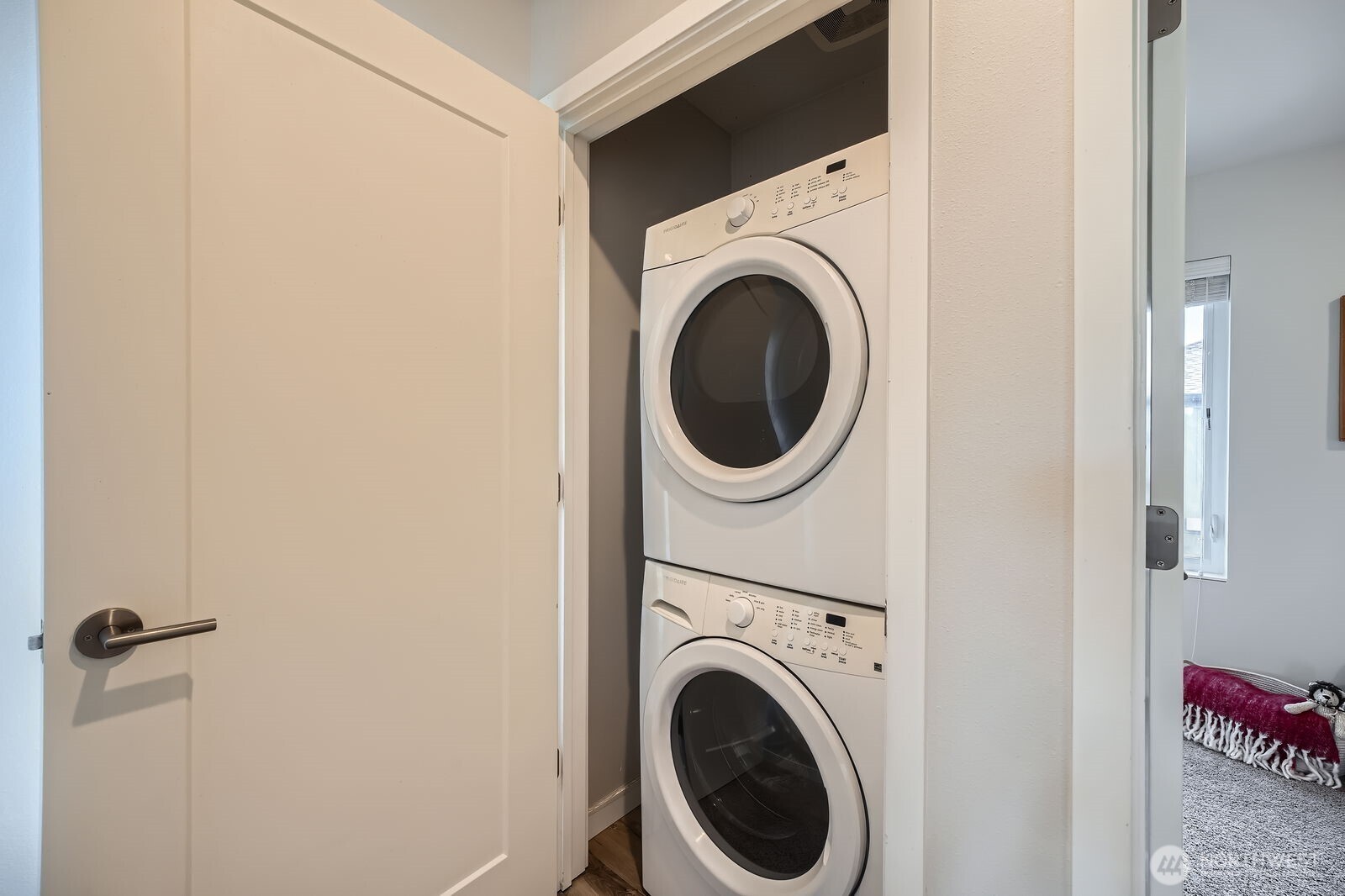 1803 Southwest 96th Lane Seattle, WA 98106 - Photo 26 of 33 a view of a hallway with washer and dryer