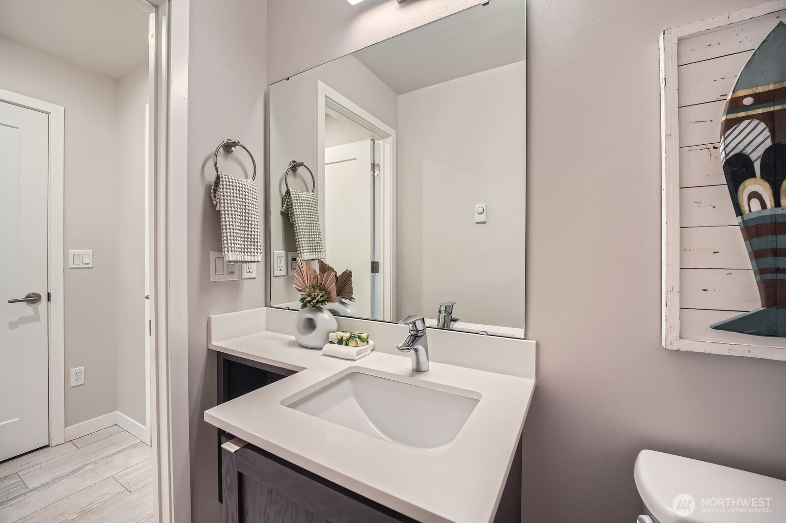 1803 Southwest 96th Lane Seattle, WA 98106 - Photo 30 of 33 a bathroom with a sink and a mirror