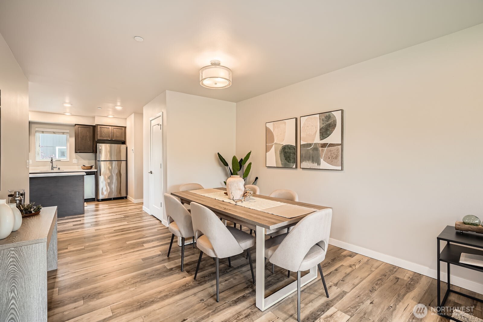 1803 Southwest 96th Lane Seattle, WA 98106 - Photo 7 of 33 a view of a dining room with furniture and wooden floor