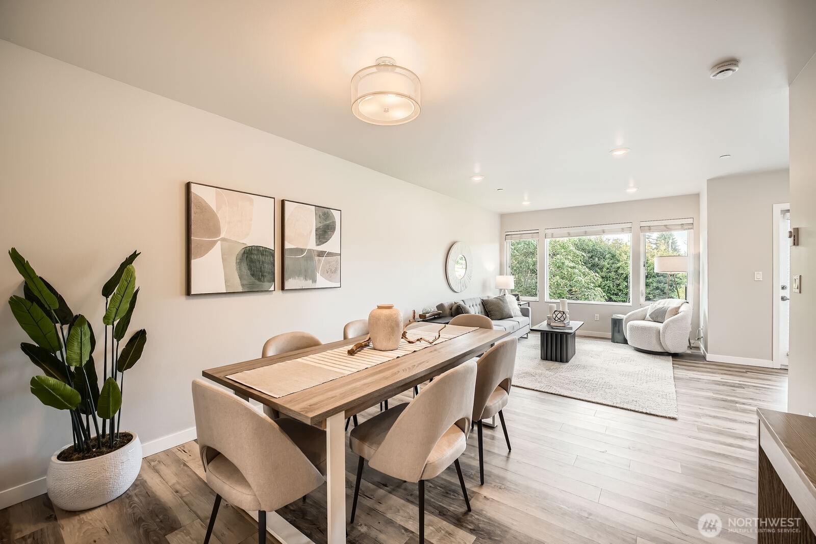 1803 Southwest 96th Lane Seattle, WA 98106 - Photo 8 of 33 a view of a dining room with furniture window and wooden floor
