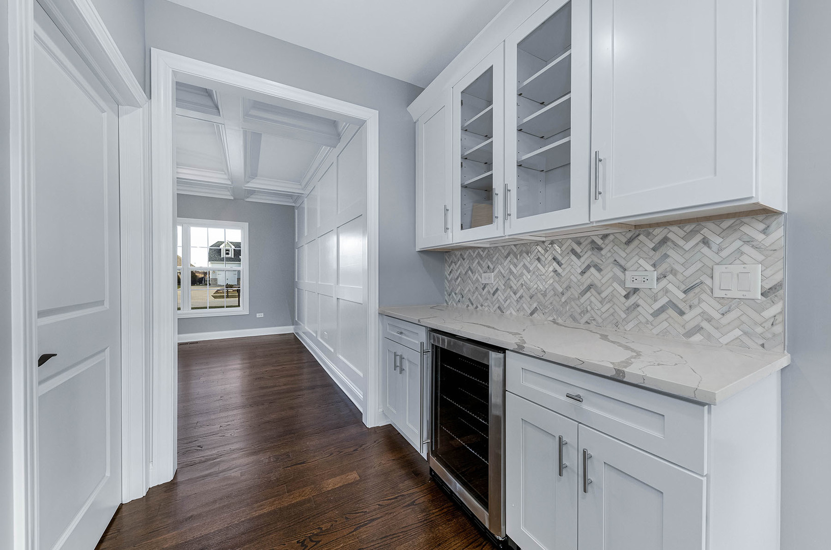 2004 Oldfield Road Darien, IL 60561 - Photo 11 of 40 a kitchen with granite countertop white cabinets and white appliances