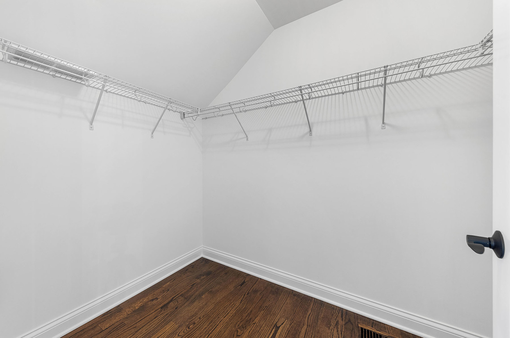 2004 Oldfield Road Darien, IL 60561 - Photo 18 of 40 a view of a room with racks on the wall