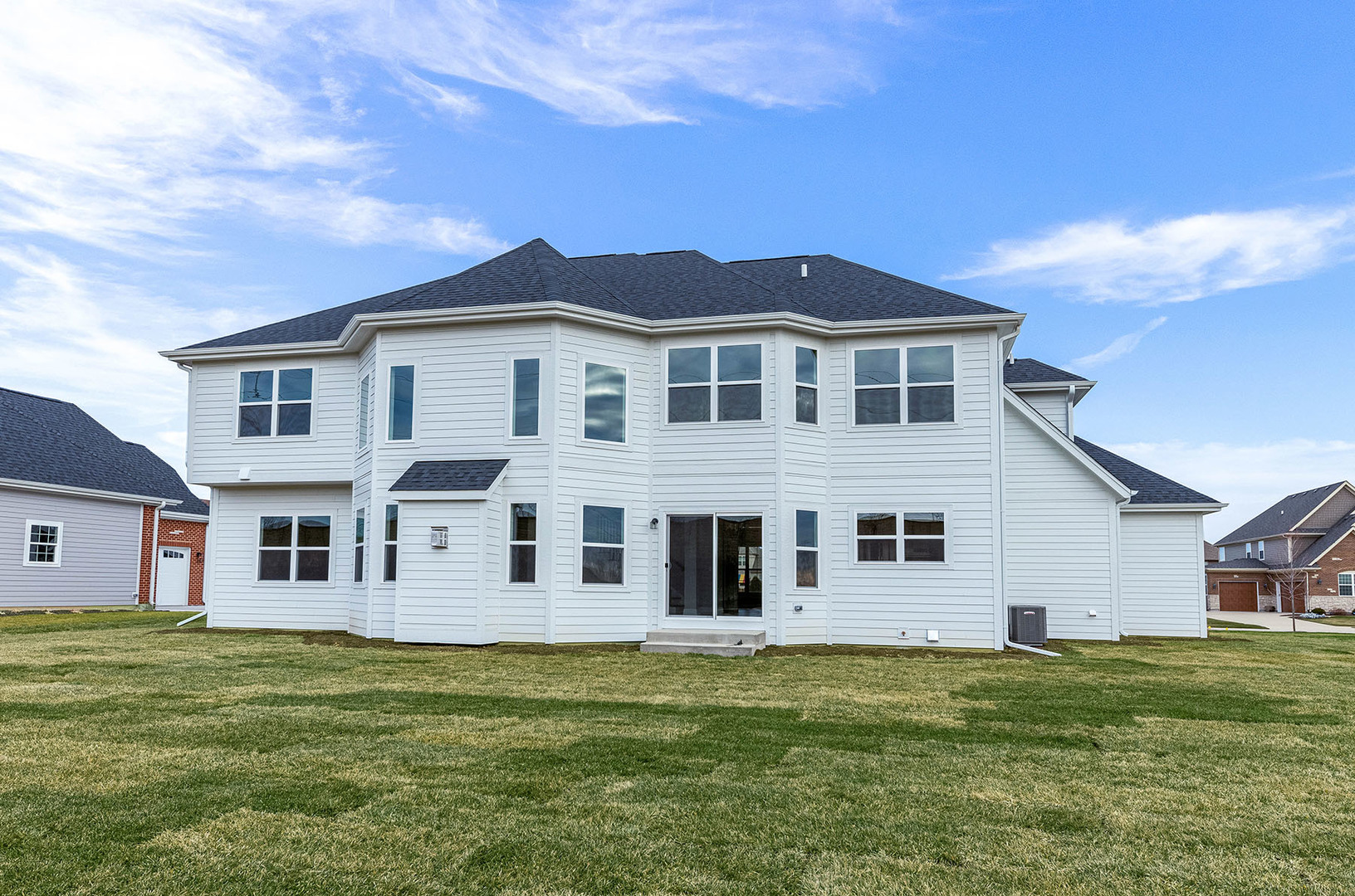 2004 Oldfield Road Darien, IL 60561 - Photo 2 of 40 a large tree in front of a white house