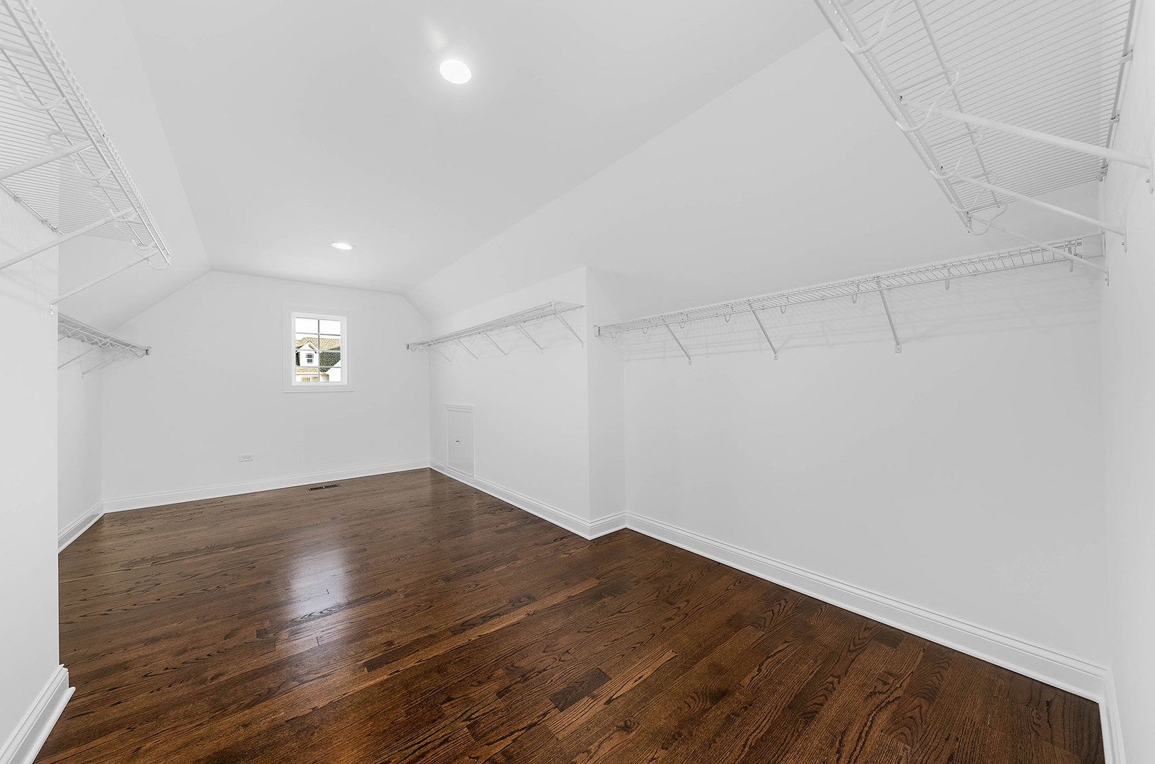 2004 Oldfield Road Darien, IL 60561 - Photo 21 of 40 an empty room with wooden floor and windows