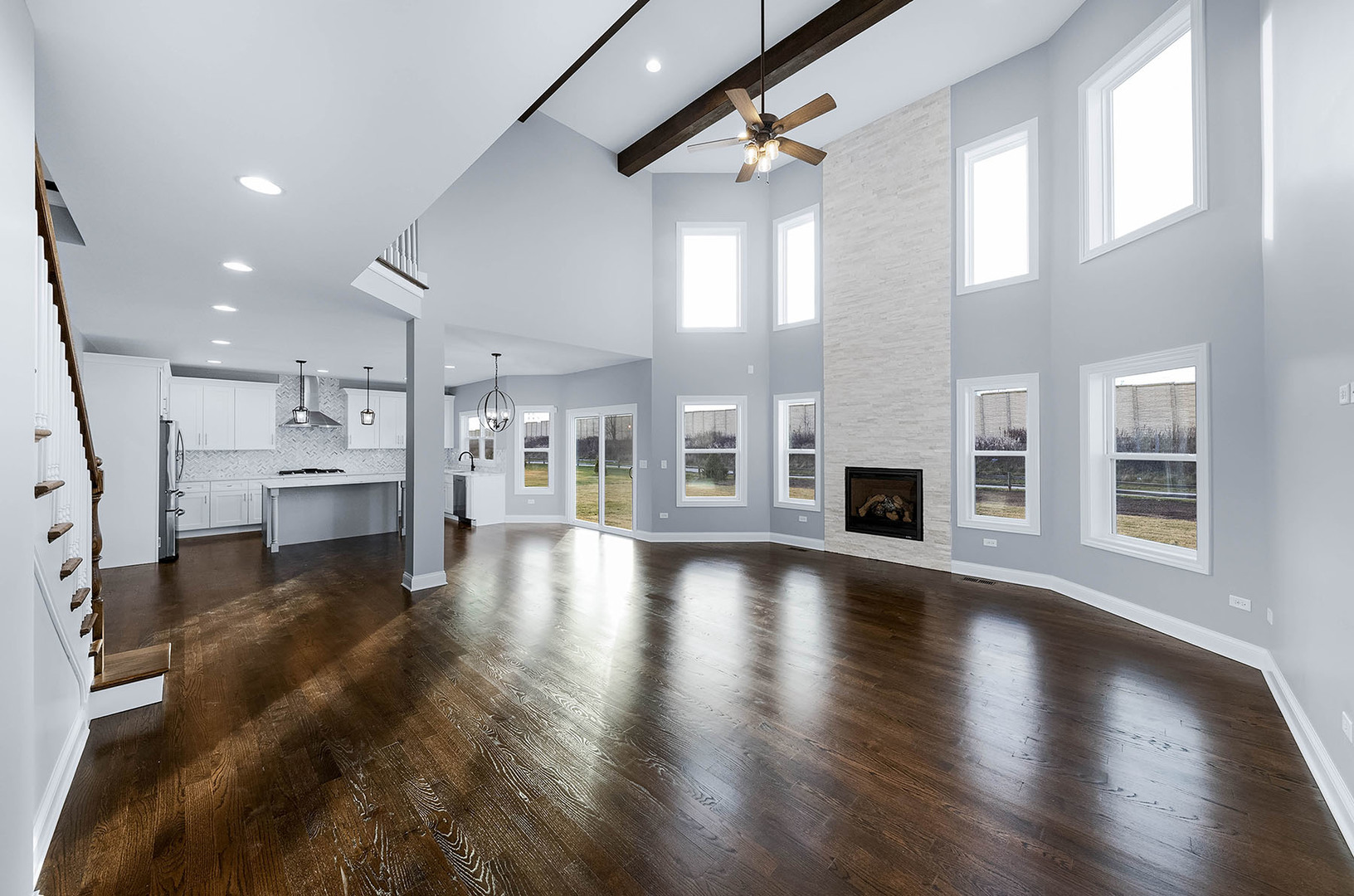 2004 Oldfield Road Darien, IL 60561 - Photo 29 of 40 a view of an empty room with wooden floor and a window