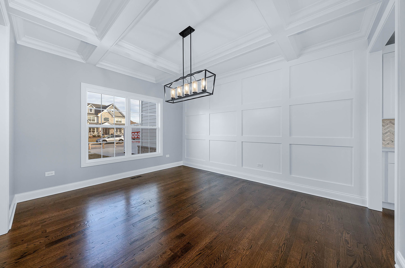 2004 Oldfield Road Darien, IL 60561 - Photo 33 of 40 a view of an empty room with wooden floor and a window