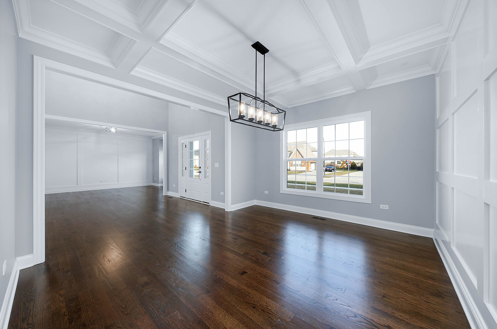 2004 Oldfield Road Darien, IL 60561 - Photo 34 of 40 a view of an empty room with wooden floor and a window