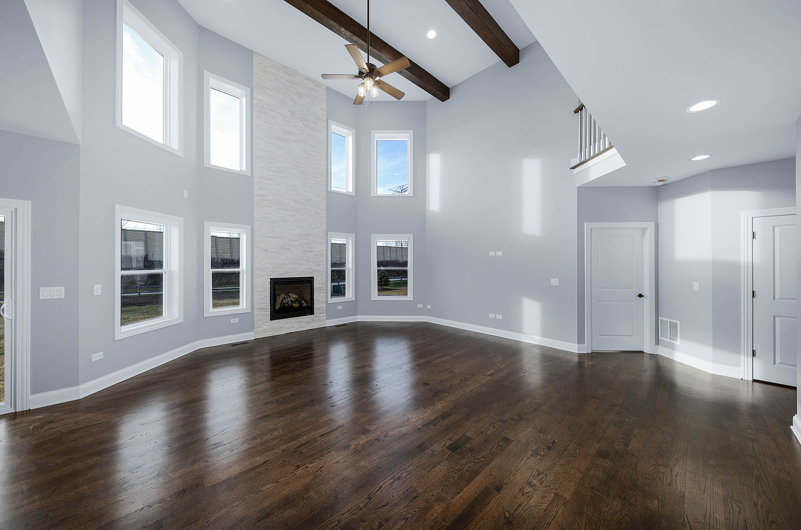 2004 Oldfield Road Darien, IL 60561 - Photo 39 of 40 a view of an empty room with wooden floor and a window