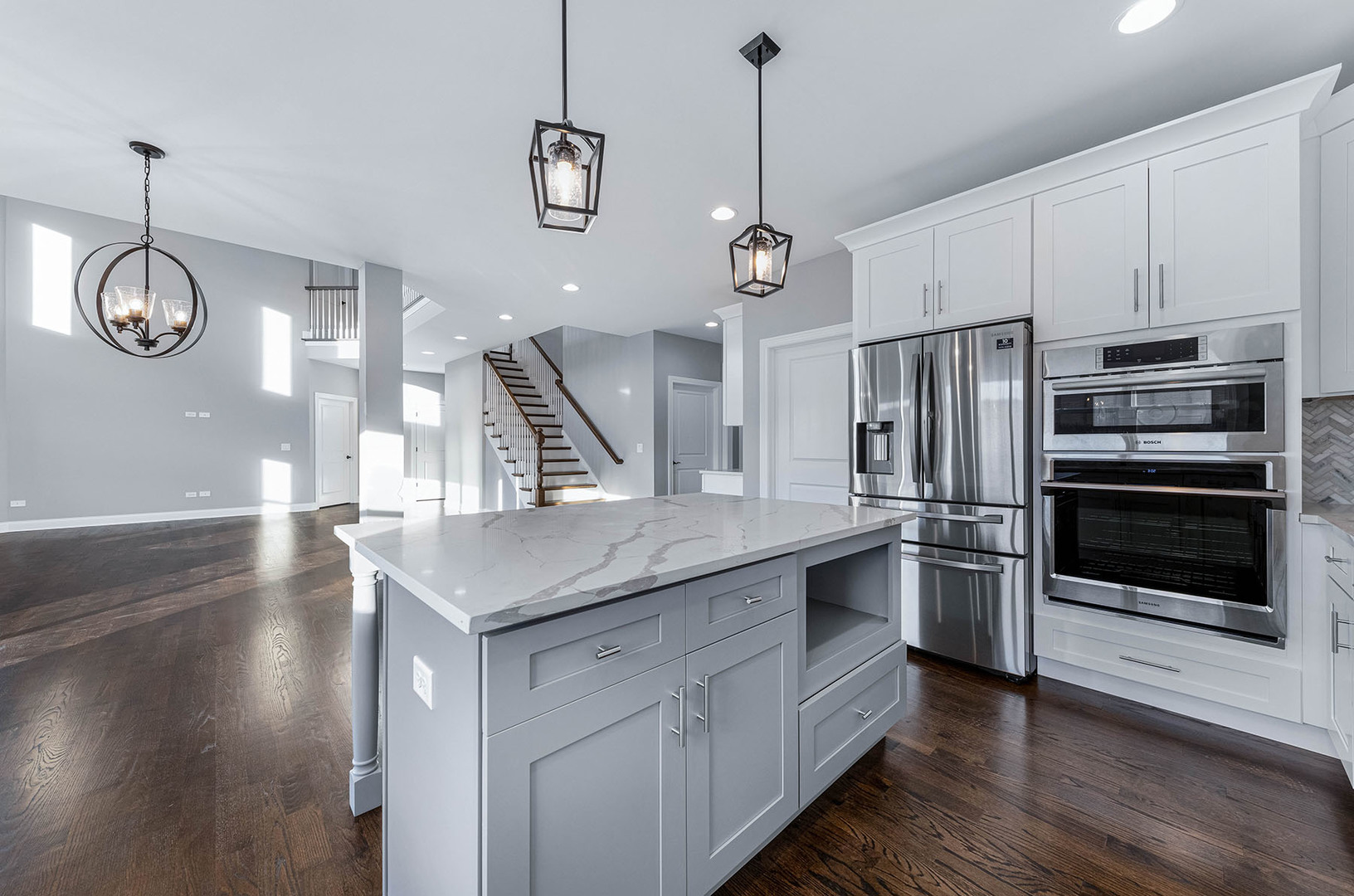2004 Oldfield Road Darien, IL 60561 - Photo 10 of 40 a kitchen with stainless steel appliances granite countertop a sink refrigerator and microwave