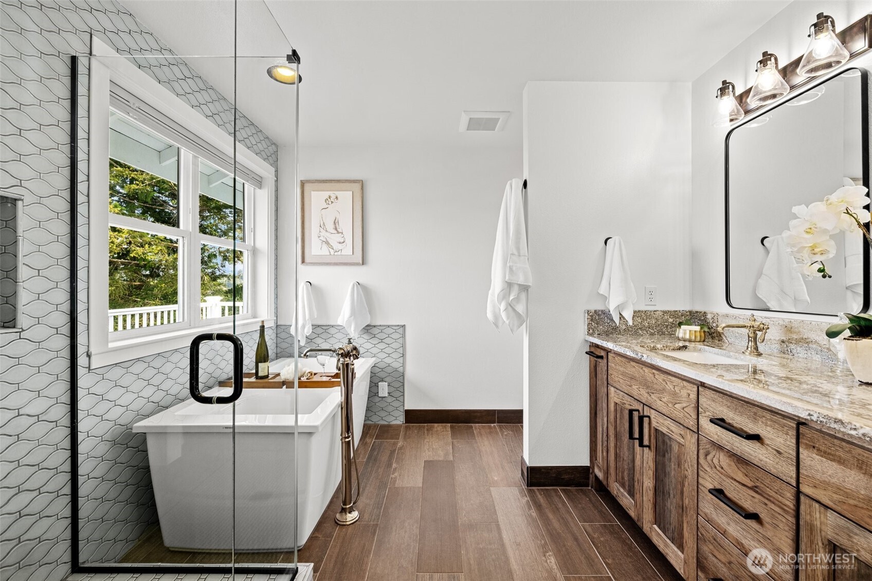 1802 Vernon Road Lake Stevens, WA 98258 - Photo 23 of 40 a bathroom with a double vanity sink a mirror and bathtub