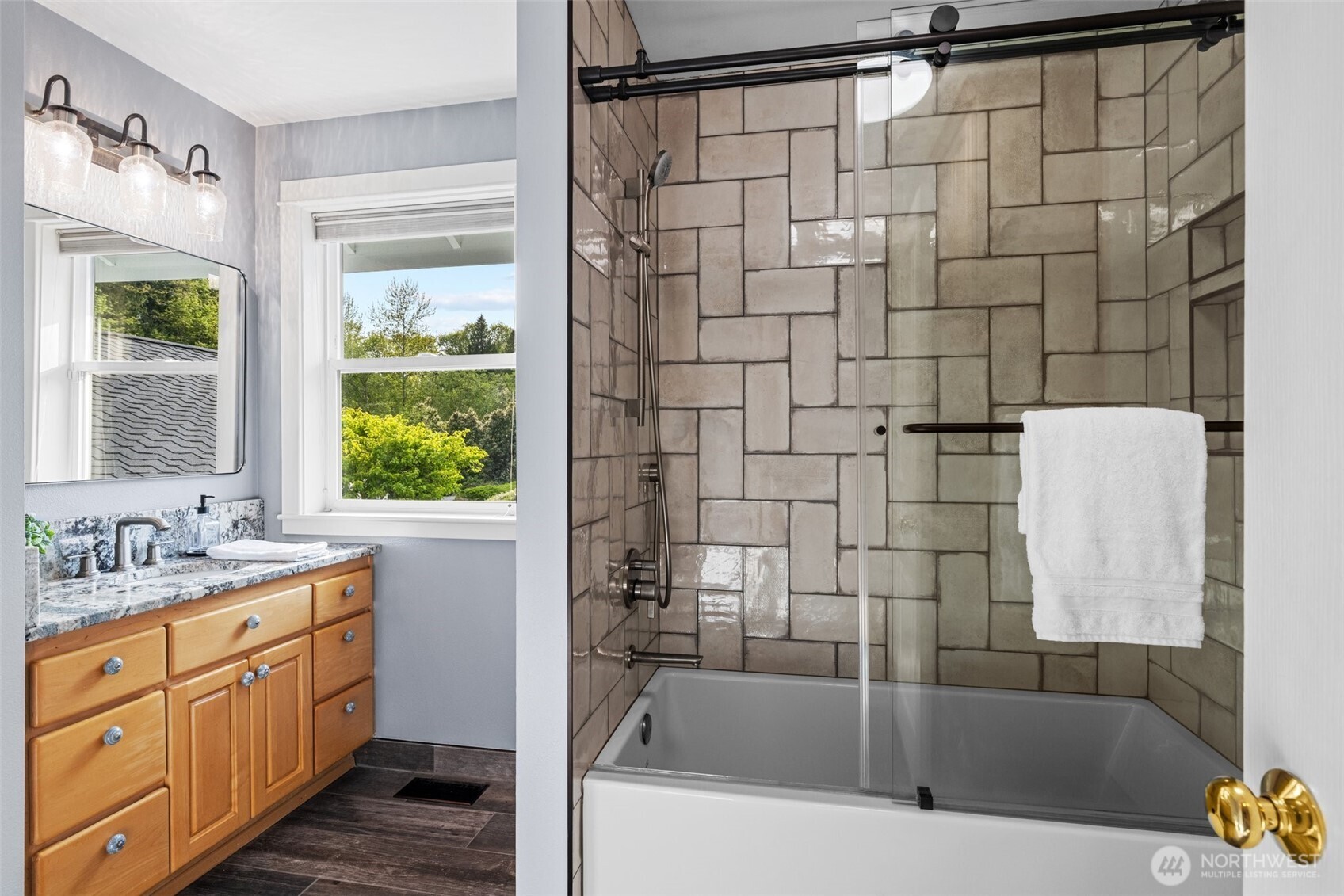1802 Vernon Road Lake Stevens, WA 98258 - Photo 29 of 40 a bathroom with a bathtub sink and window