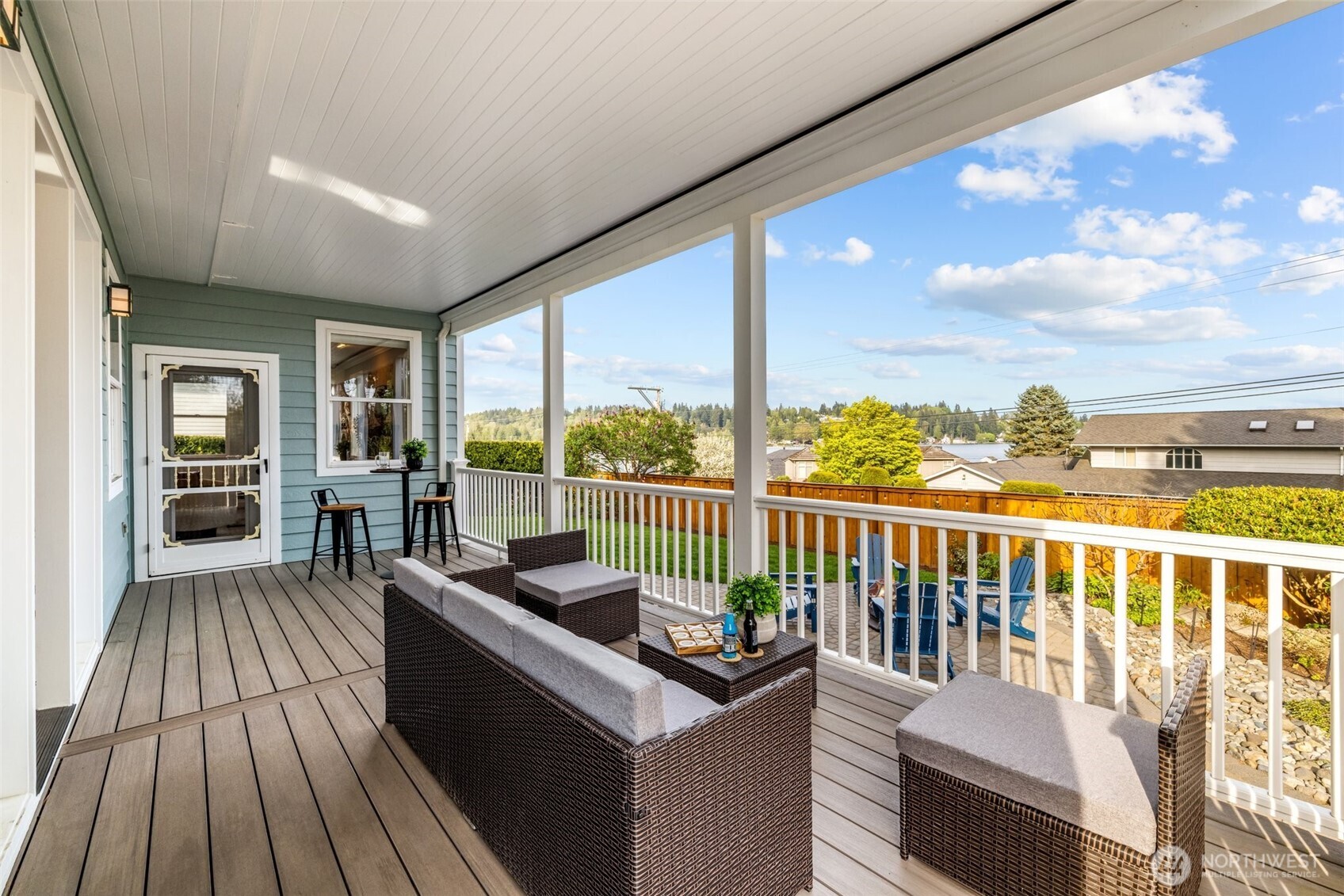 1802 Vernon Road Lake Stevens, WA 98258 - Photo 7 of 40 a balcony with furniture and wooden floor