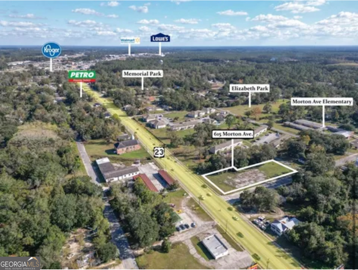 615 Morton Avenue Waycross, GA 31501 - Photo 3 of 5 an aerial view of residential houses with outdoor space