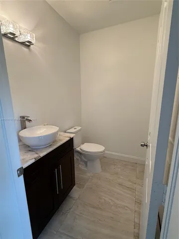 a bathroom with a sink and a toilet