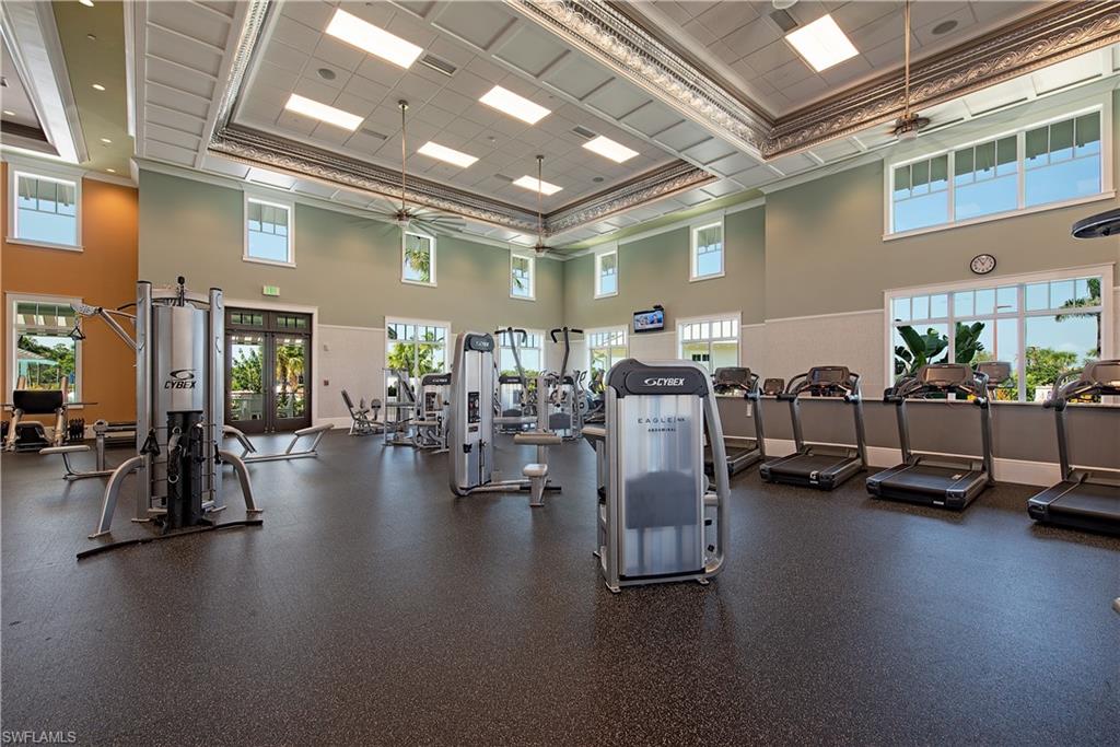 6822 Bequia Way Naples, FL 34113 - Photo 23 of 28 a view of a room with gym equipment