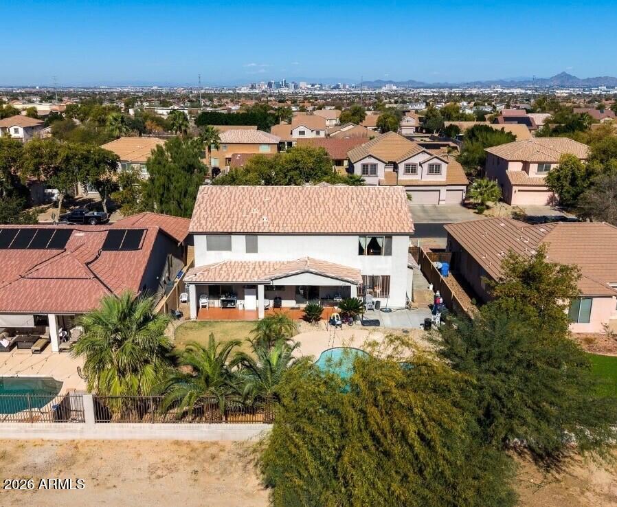 1813 East Beverly Road Phoenix, AZ 85042 - Photo 29 of 32 an aerial view of a house with a lake view