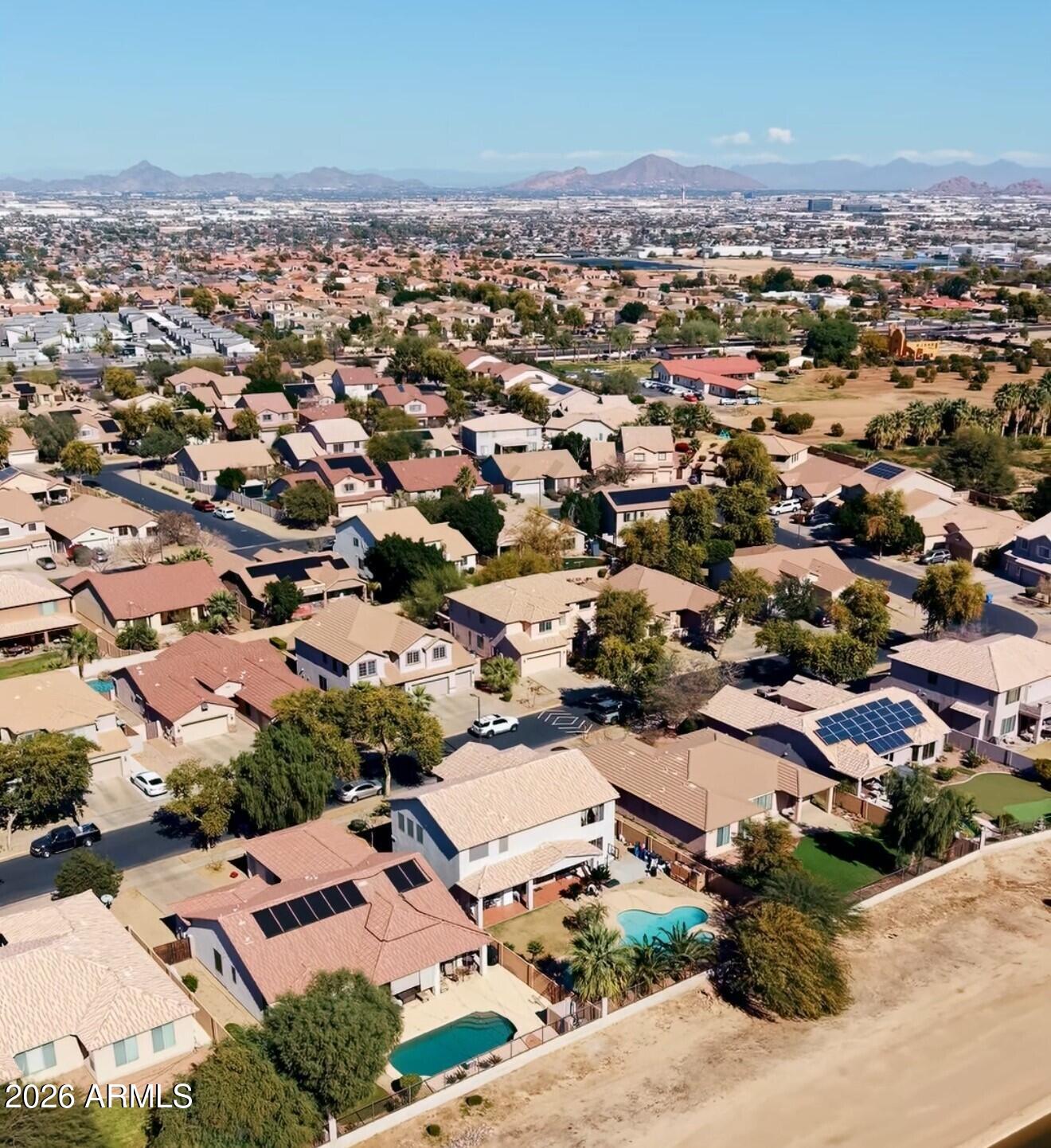 1813 East Beverly Road Phoenix, AZ 85042 - Photo 31 of 32 an aerial view of residential building with green space