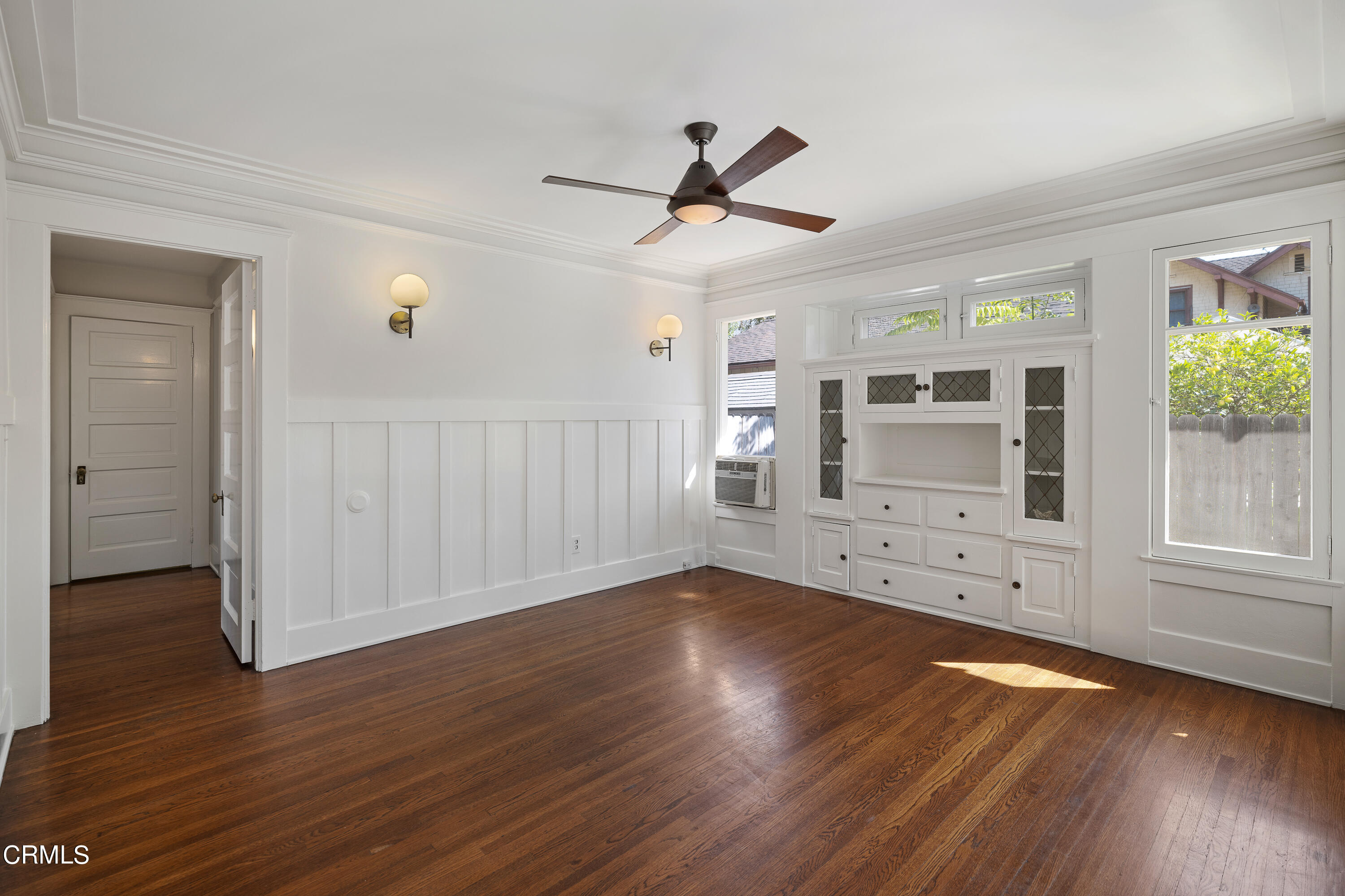 489 Miles Street Pasadena, CA 91106 - Photo 11 of 46 a view of empty room with wooden floor and fan