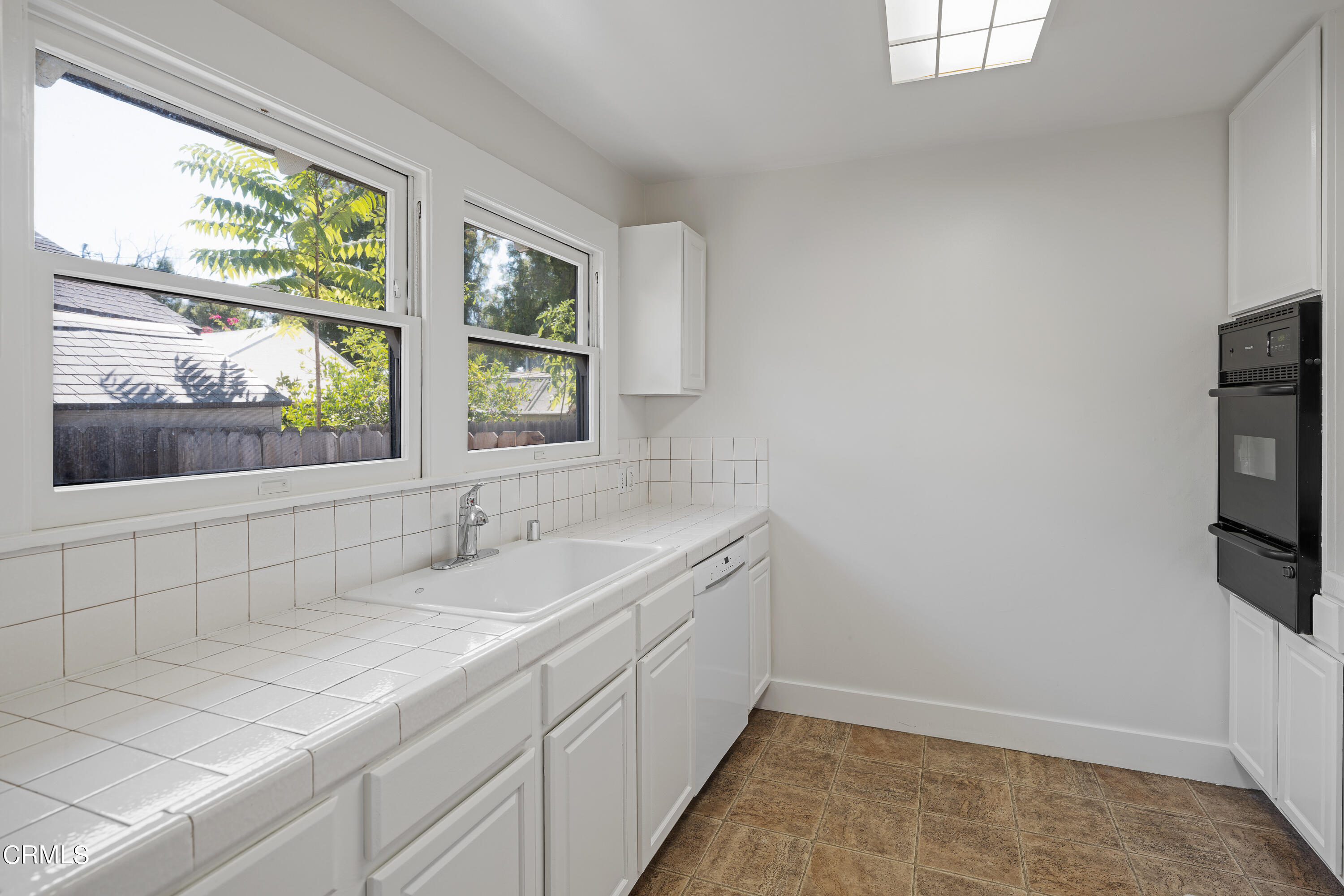 489 Miles Street Pasadena, CA 91106 - Photo 15 of 46 a bathroom with a sink and a window