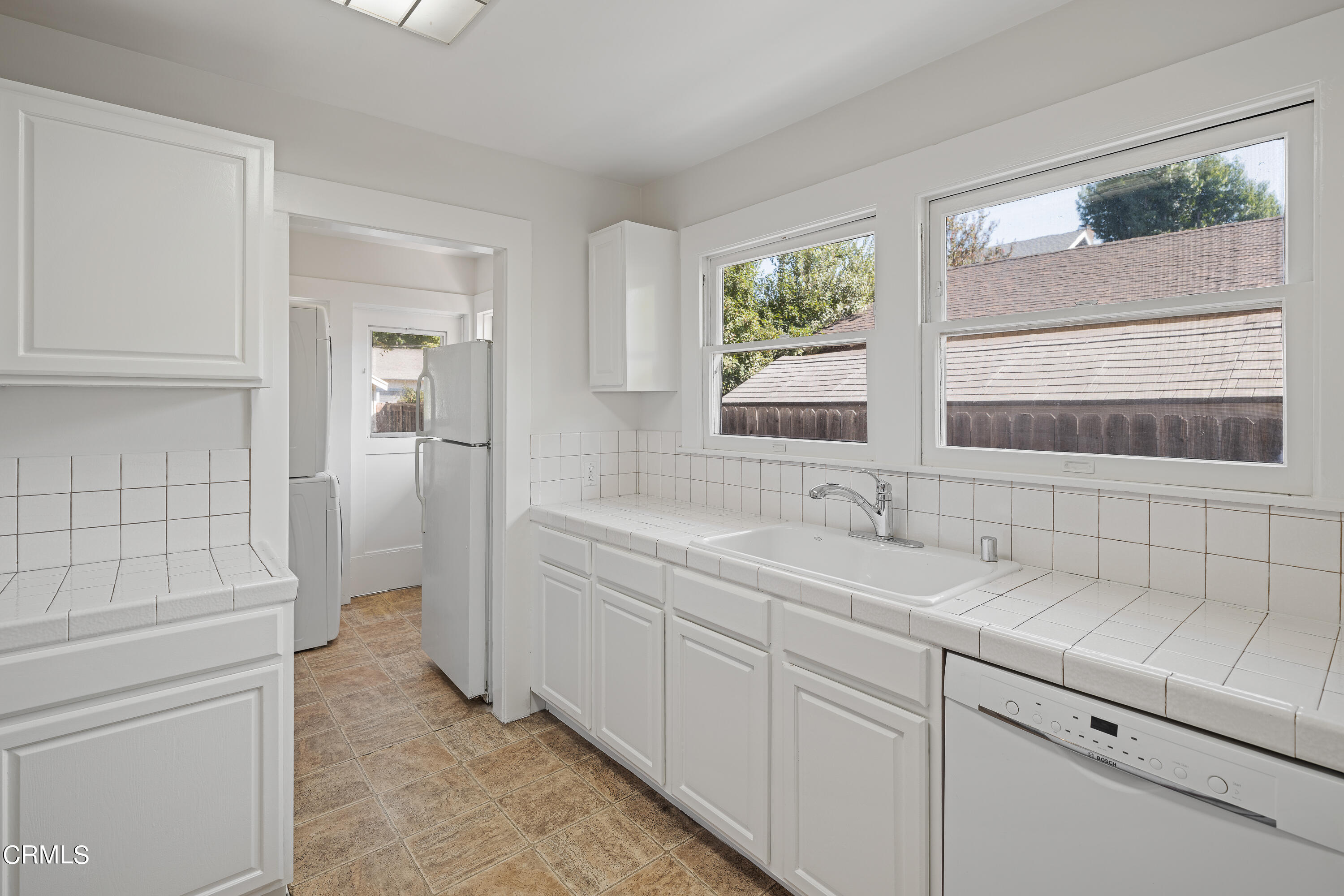 489 Miles Street Pasadena, CA 91106 - Photo 16 of 46 a bathroom with a sink and a mirror