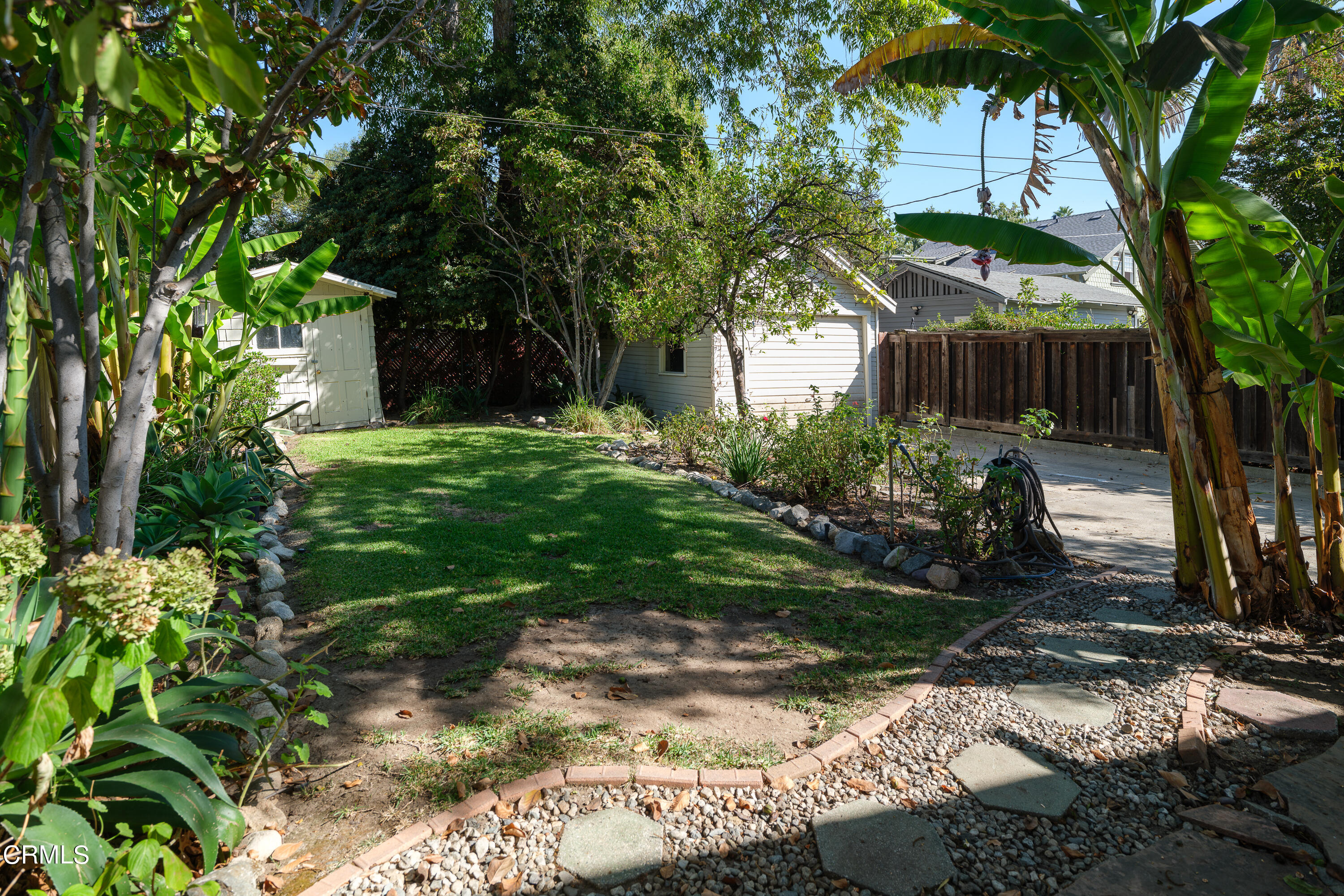 489 Miles Street Pasadena, CA 91106 - Photo 38 of 46 a backyard of a house with lots of green space