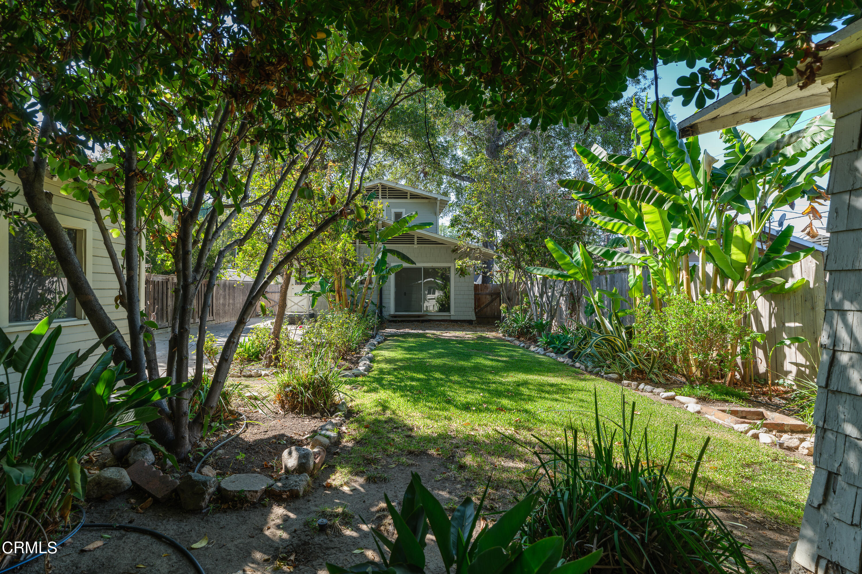 489 Miles Street Pasadena, CA 91106 - Photo 40 of 46 a backyard of a house with lots of green space