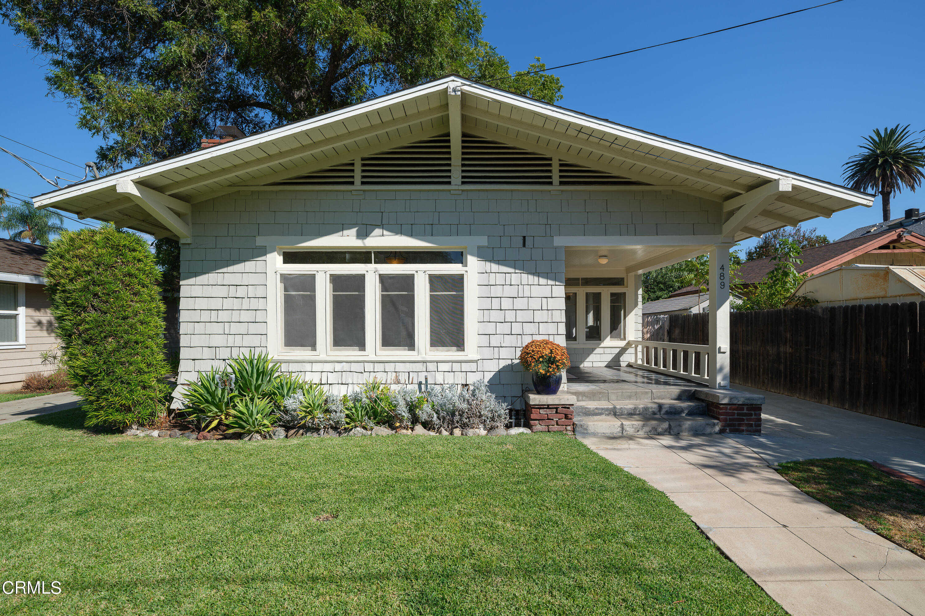 489 Miles Street Pasadena, CA 91106 - Photo 43 of 46 a front view of a house with garden