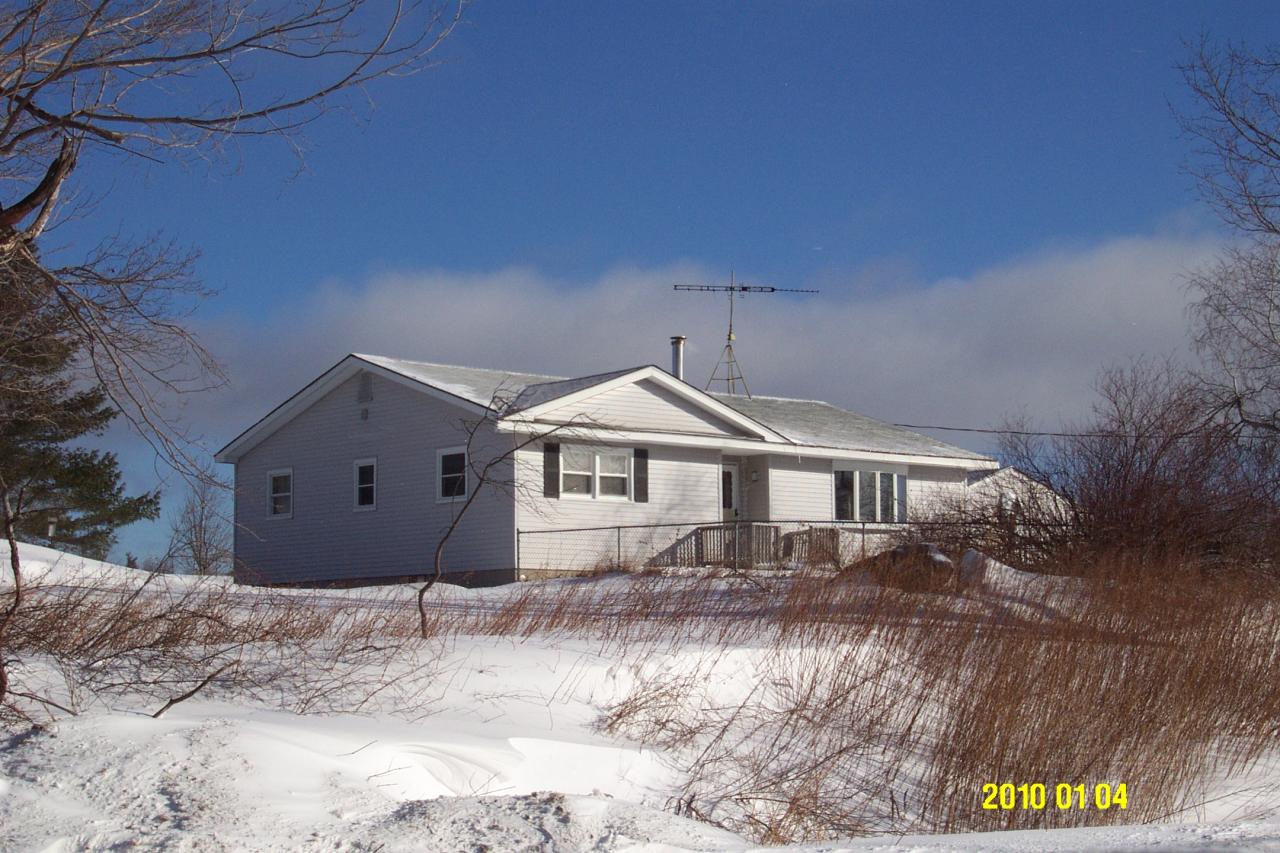 95 East Main Road Peru, MA 01235 - Photo 1 of 18 a front view of a house with a yard