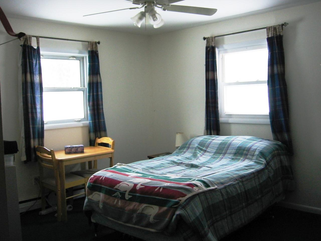 95 East Main Road Peru, MA 01235 - Photo 12 of 18 a bedroom with a bed and two windows