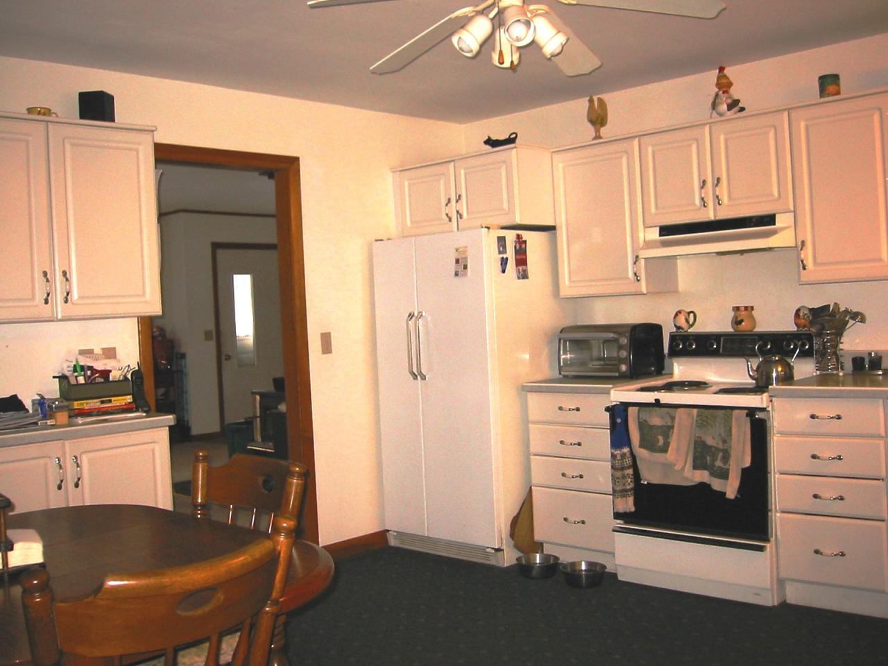 95 East Main Road Peru, MA 01235 - Photo 4 of 18 a kitchen with stainless steel appliances a stove a refrigerator and cabinets