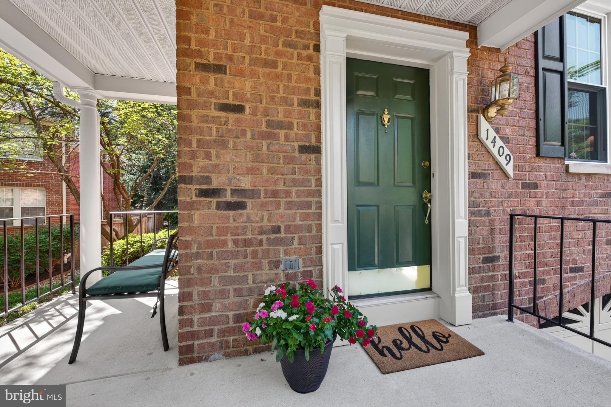 1409 Park Garden Lane Reston, VA 20194 - Photo 3 of 41 a view of a balcony with chairs potted plants