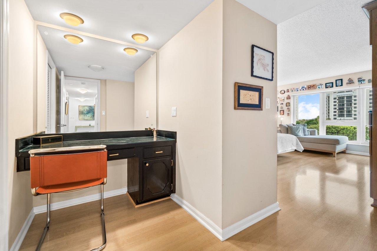 2066 North Ocean Boulevard, Unit 4NW Boca Raton, FL 33431 - Photo 15 of 31 a living room with furniture and a wooden floor