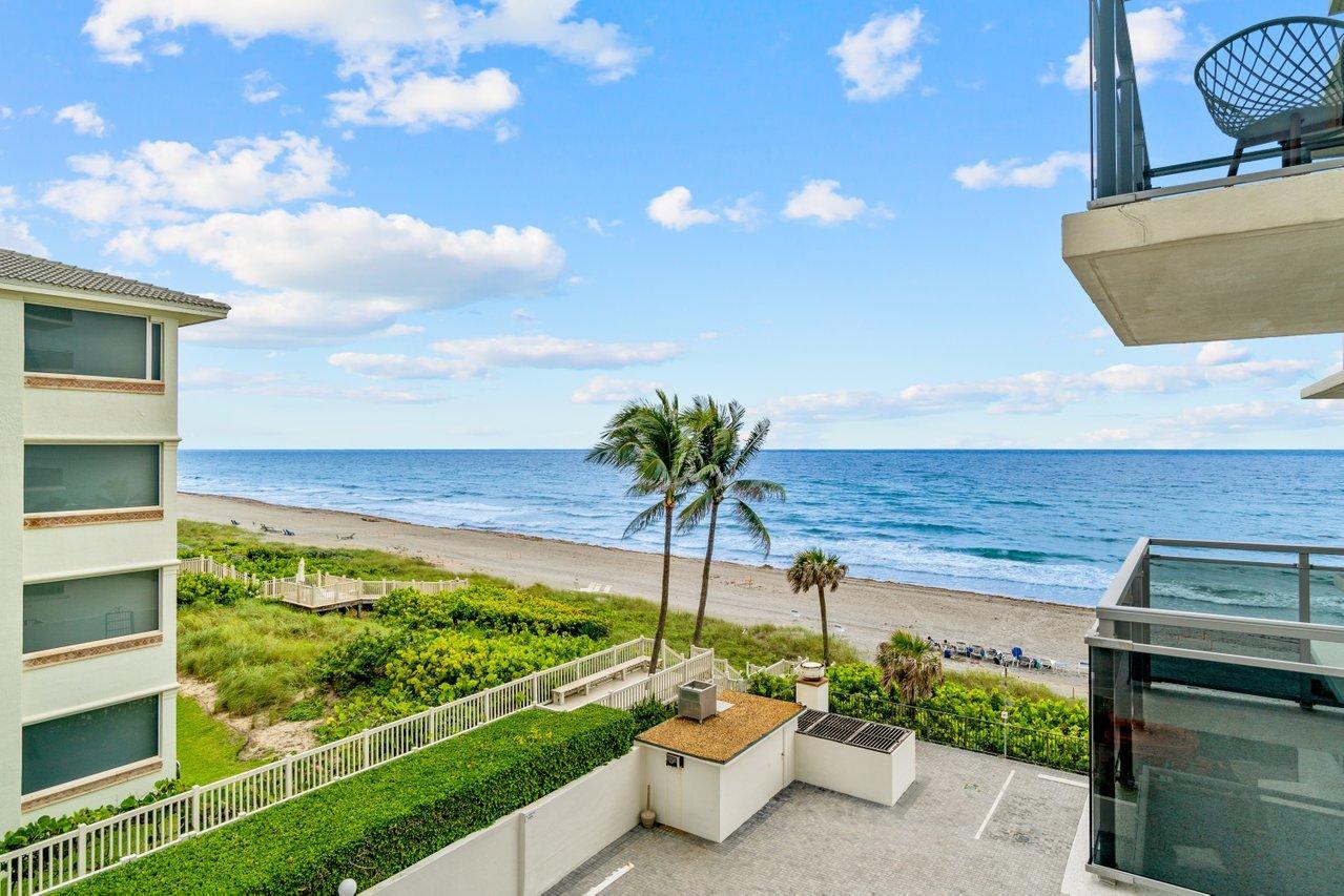 2066 North Ocean Boulevard, Unit 4NW Boca Raton, FL 33431 - Photo 6 of 31 a view of a chairs and table in patio