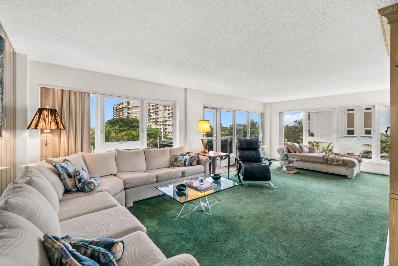2066 North Ocean Boulevard, Unit 4NW Boca Raton, FL 33431 - Photo 7 of 31 a living room with furniture and a large window