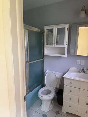 a bathroom with a sink and a toilet