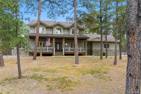 a front view of a building with street view