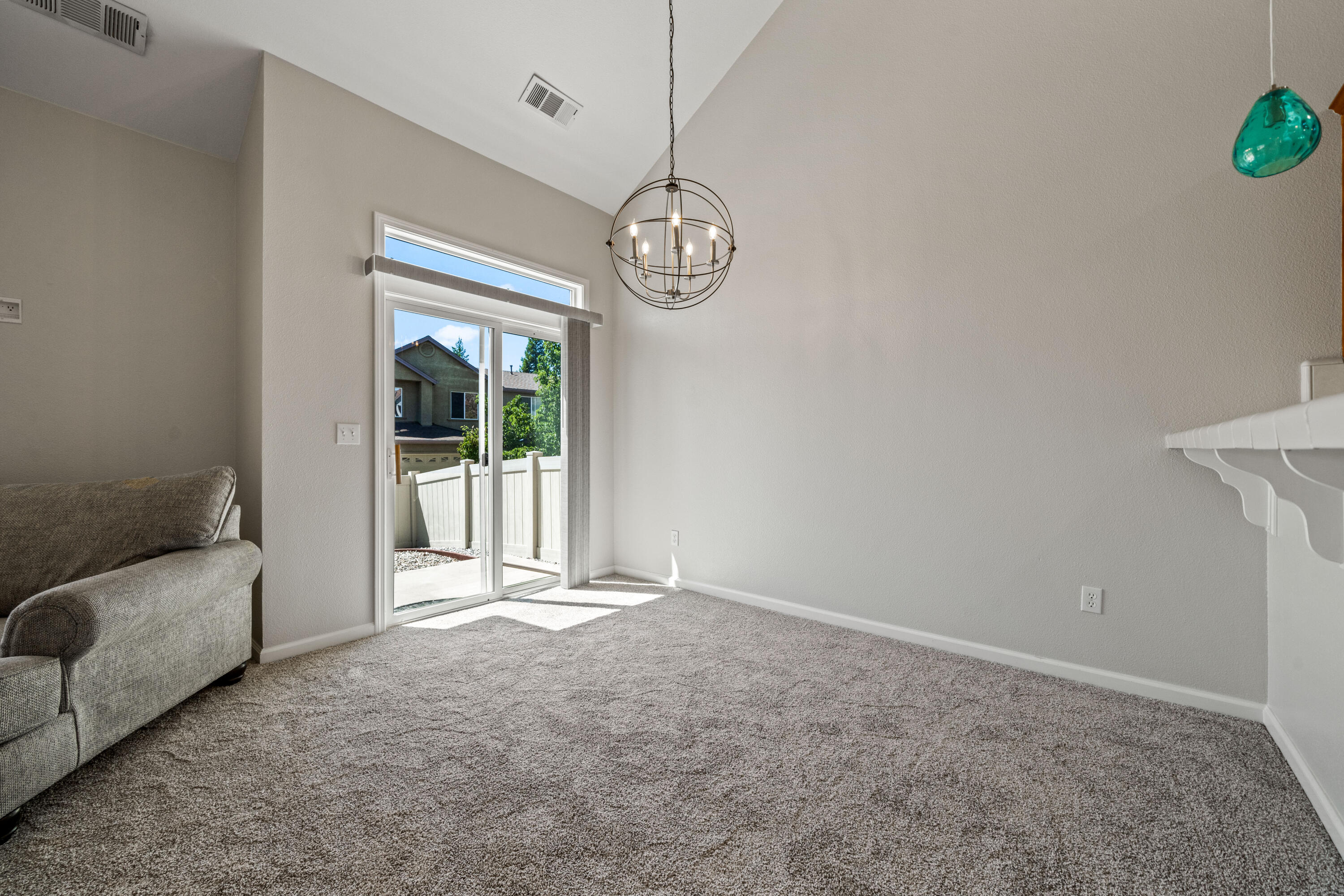 3180 Sinaloa Trail Redding, CA 96002 - Photo 8 of 22 a view of an empty room with a window