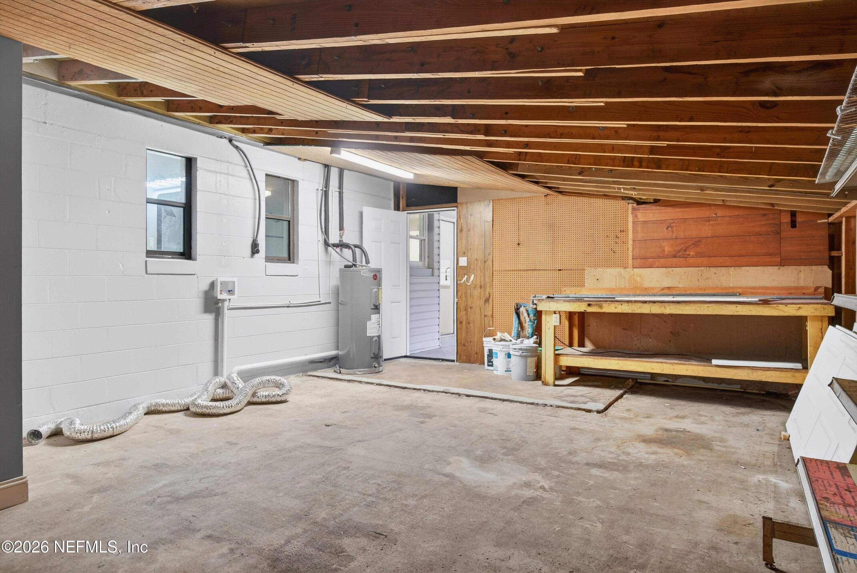 4725 Tango Lane West Jacksonville, FL 32210 - Photo 46 of 54 a view of a room with gym equipment