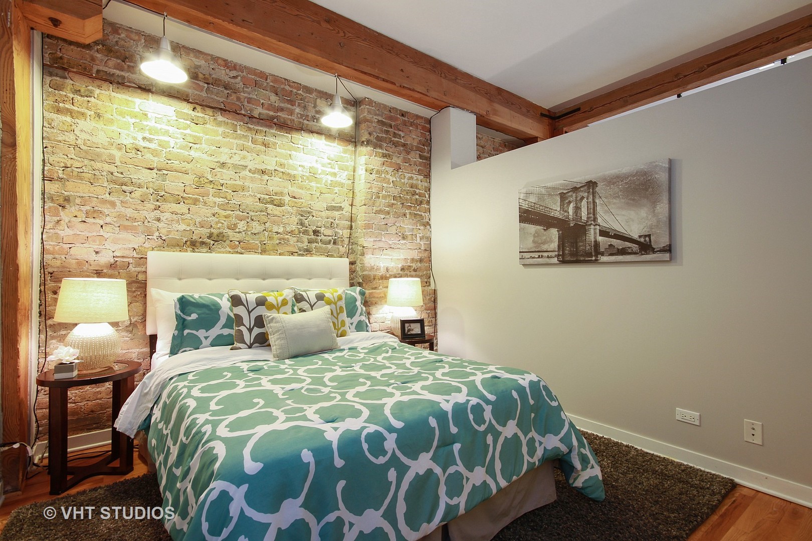 1344 West Madison Street, Unit 201 Chicago, IL 60607 - Photo 9 of 10 a bedroom with a large bed and a window