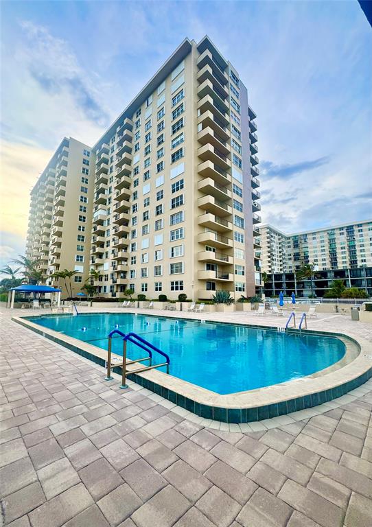 2000 South Ocean Boulevard, Unit 5P Lauderdale-by-the-Sea, FL 33062 - Photo 22 of 34 a view of swimming pool with outdoor seating